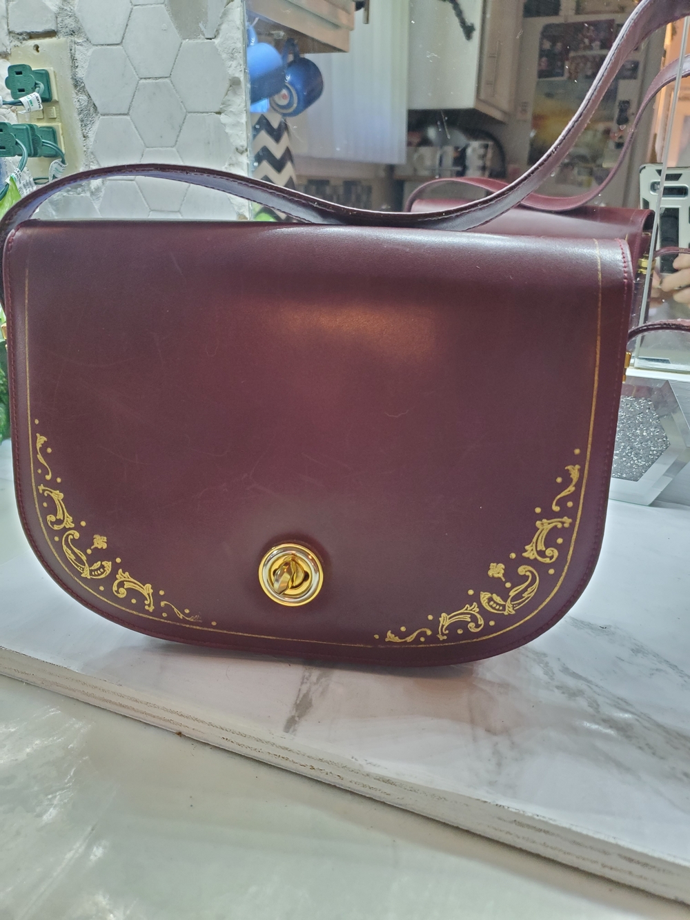 Women's Burgundy Crossbody Bag with Gold Scroll Detailing